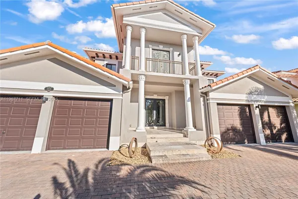 a front view of a house with a outdoor space