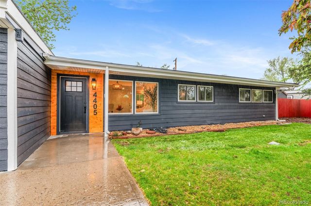 a front view of house with yard