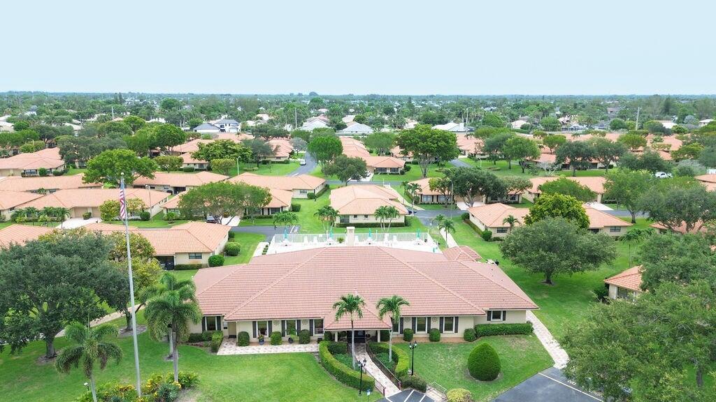 4600 Wildwood Tree Lane, Unit A Boynton Beach, FL 33436 - Photo 27 of 30 an aerial view of residential houses with outdoor space and street view