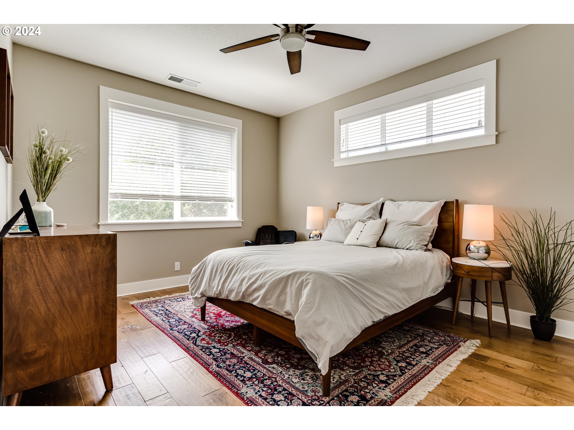 3278 Timberline Drive Eugene, OR 97405 - Photo 16 of 41 a bedroom with a bed and wooden floor