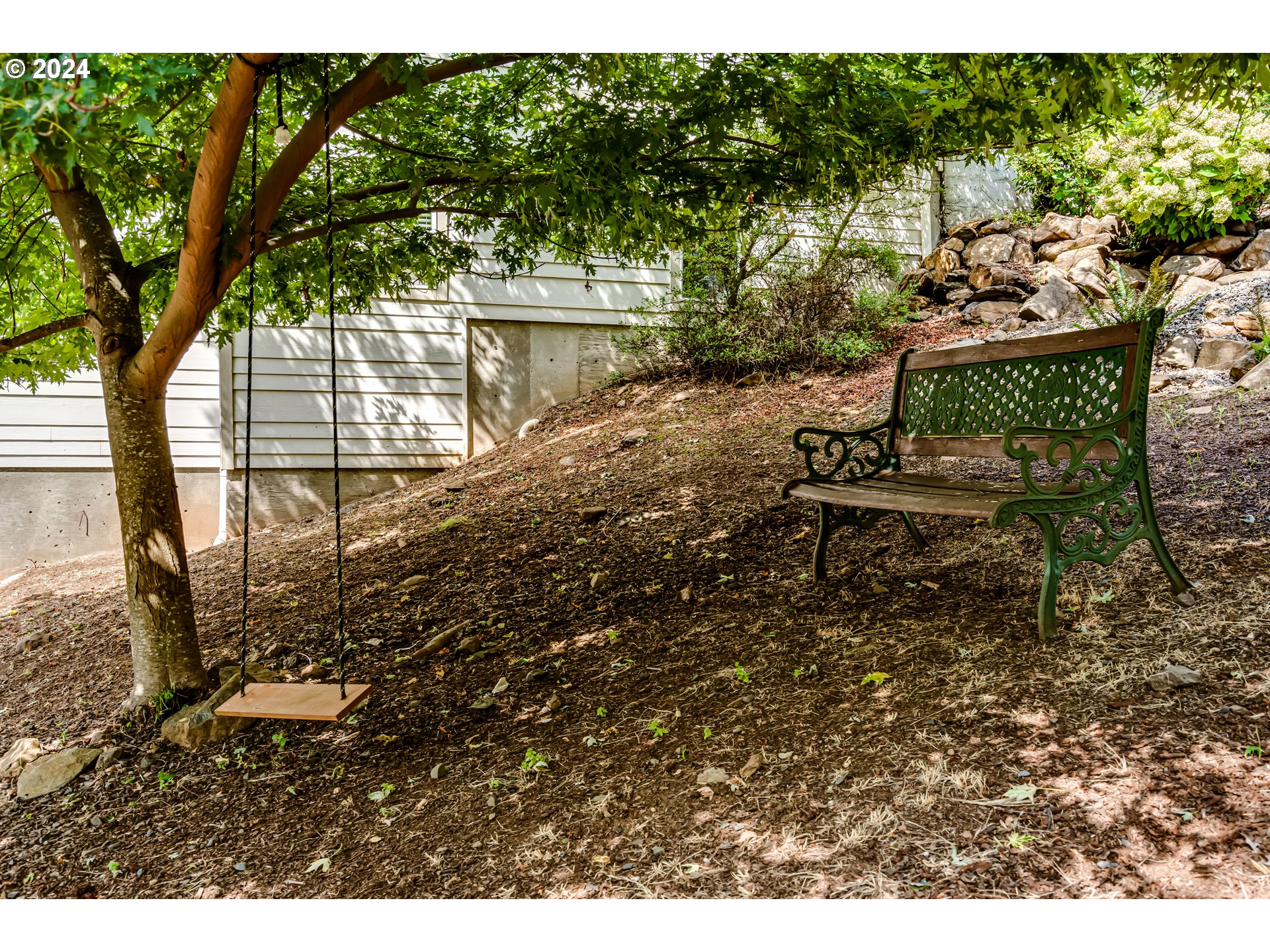 3278 Timberline Drive Eugene, OR 97405 - Photo 38 of 41 a view of backyard with a table and chairs and potted plants