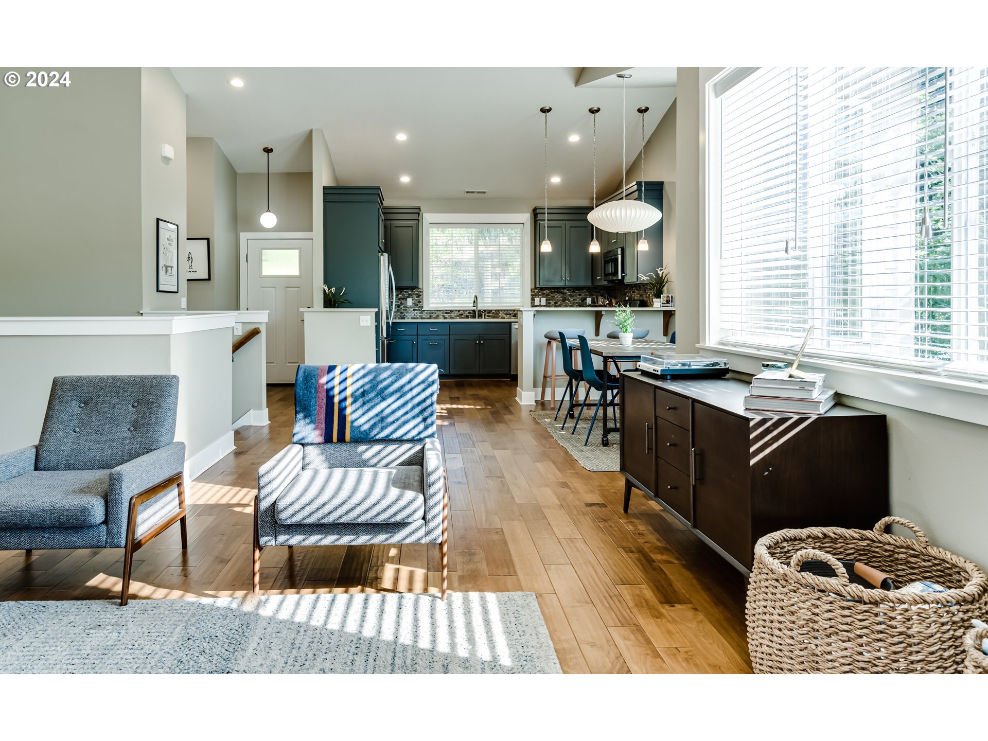 3278 Timberline Drive Eugene, OR 97405 - Photo 9 of 41 a living room with furniture potted plant and a table