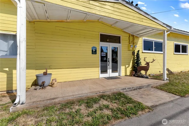 a backyard of a house with seating space
