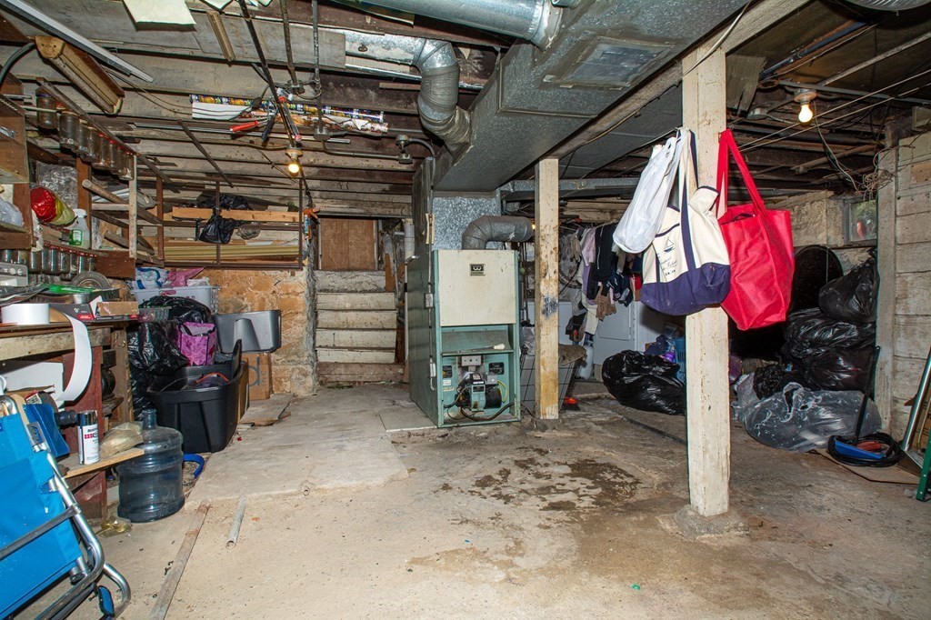 823 Broadway Everett, MA 02149 - Photo 12 of 16 a view of a storage room with a lot of stuff