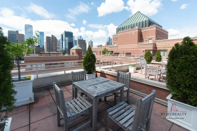 a view of a terrace with sitting area