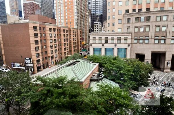 a view of a building with a yard