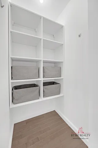 a view with cabinets and closet