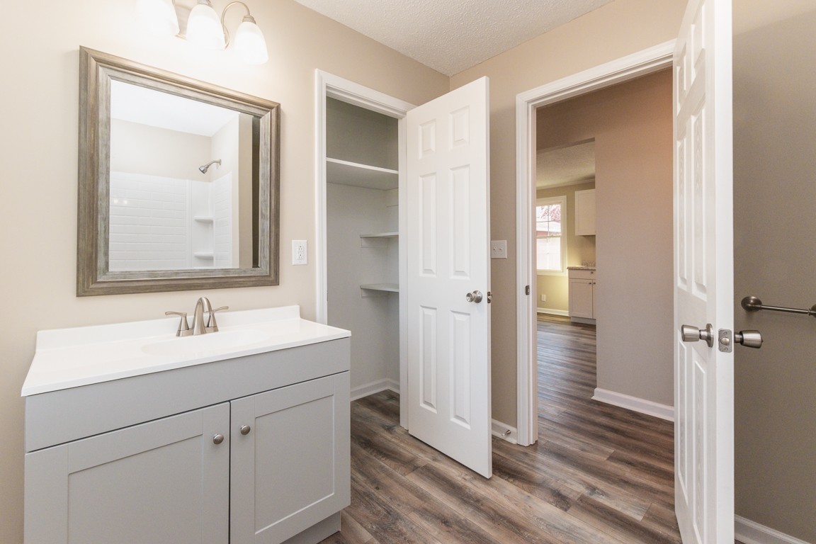 816 Garrettsburg Road Clarksville, TN 37042 - Photo 15 of 34 a bathroom with a sink and mirror