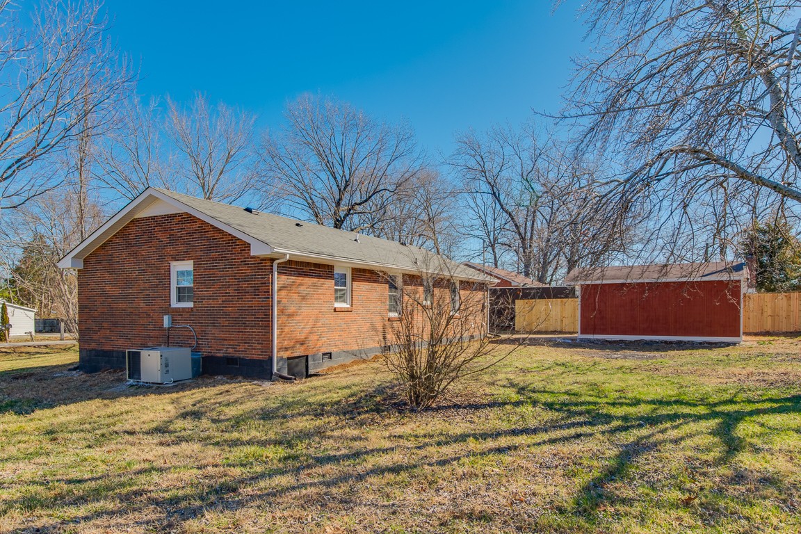 816 Garrettsburg Road Clarksville, TN 37042 - Photo 31 of 34 a view of a house with a yard