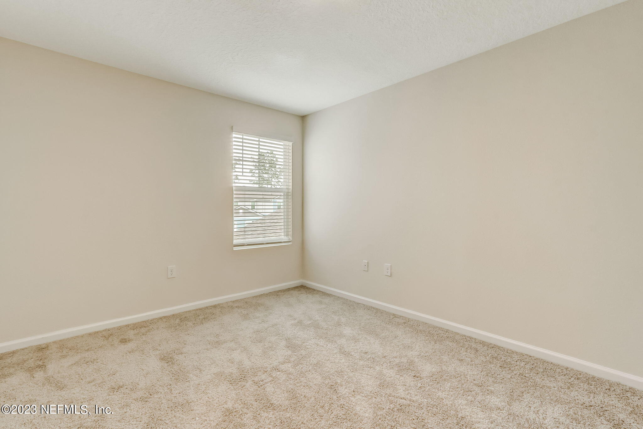 832 Observatory Parkway Jacksonville, FL 32218 - Photo 20 of 27 a view of an empty room with a window