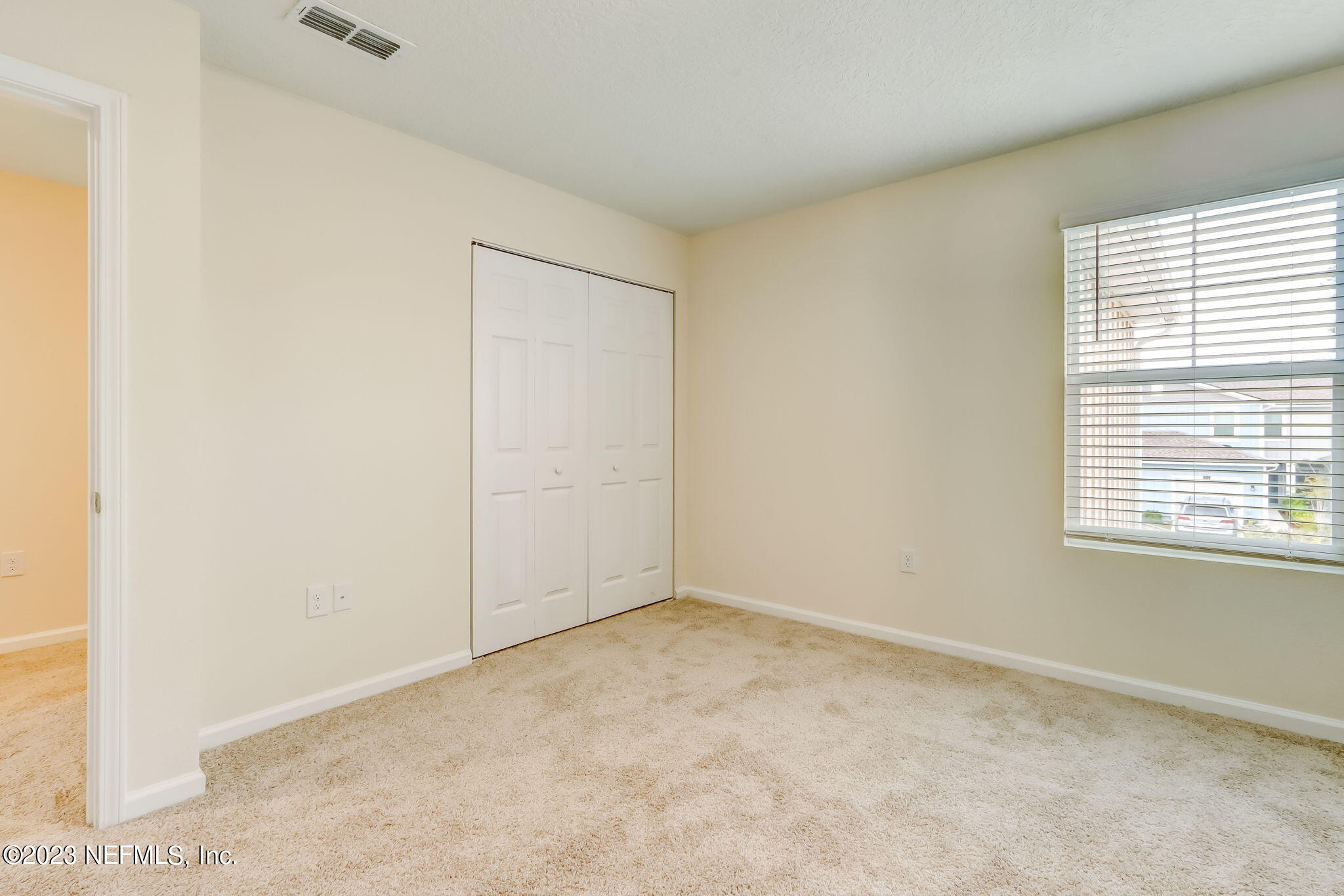 832 Observatory Parkway Jacksonville, FL 32218 - Photo 21 of 27 a view of an empty room with a window