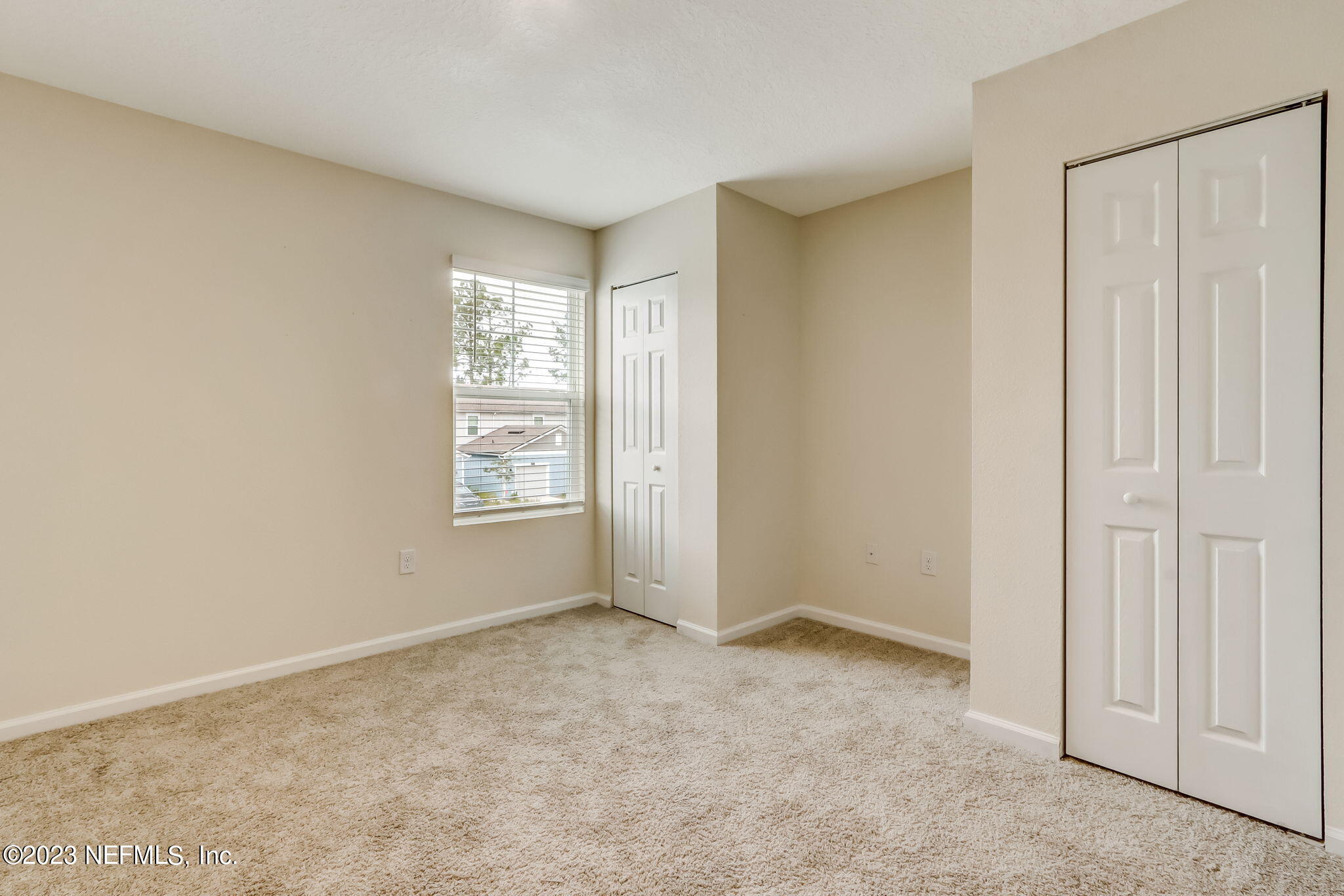 832 Observatory Parkway Jacksonville, FL 32218 - Photo 23 of 27 a view of an empty room with a window