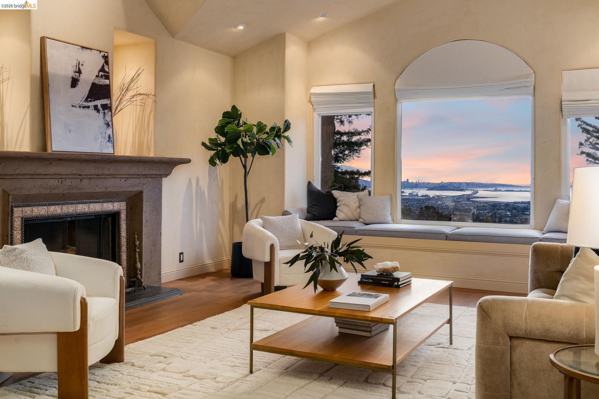 6257 Virgo Road Oakland, CA 94611 - Photo 3 of 60 a living room with furniture and a fireplace