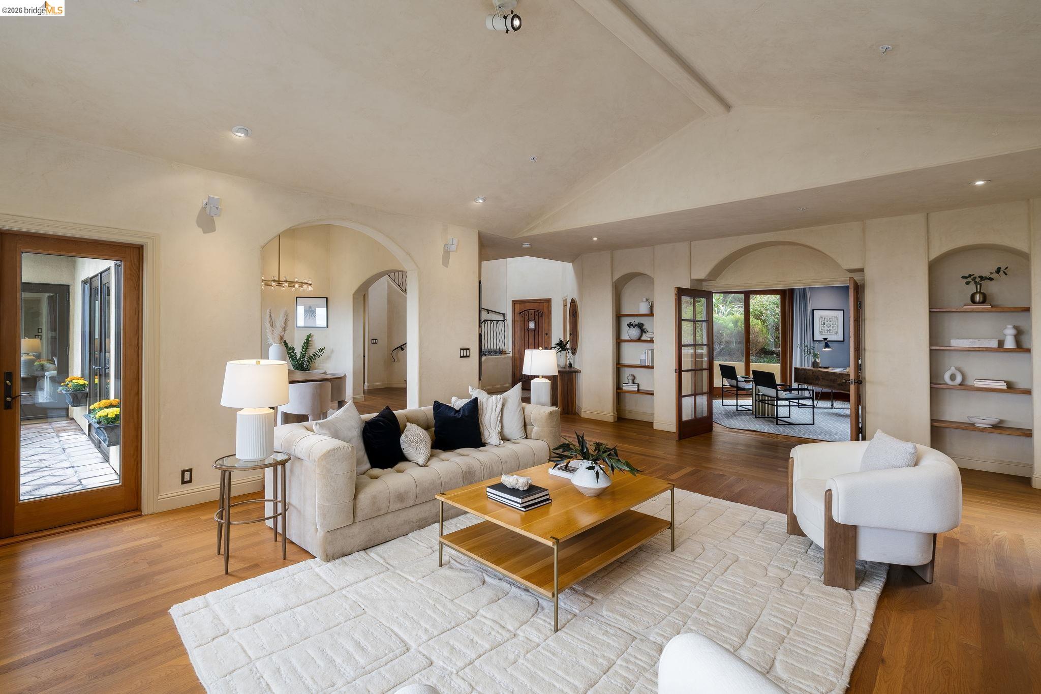 6257 Virgo Road Oakland, CA 94611 - Photo 31 of 60 a living room with furniture and wooden floor