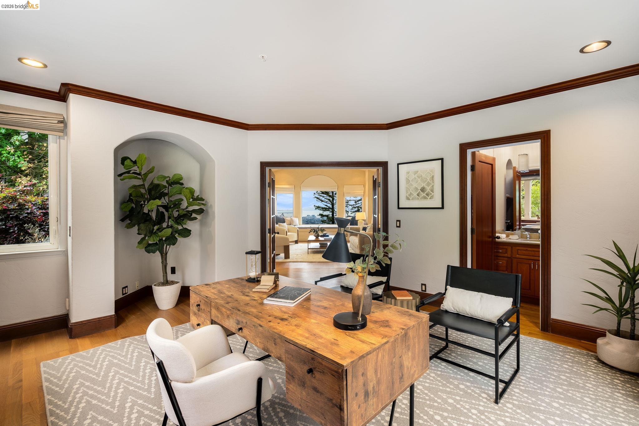 6257 Virgo Road Oakland, CA 94611 - Photo 33 of 60 a living room with furniture and a potted plant