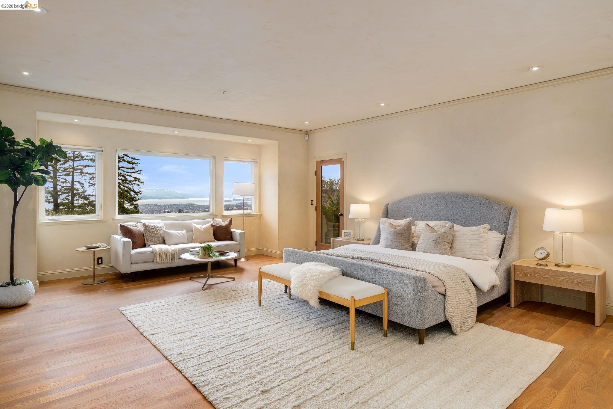 6257 Virgo Road Oakland, CA 94611 - Photo 36 of 60 a bedroom with a bed and a couch