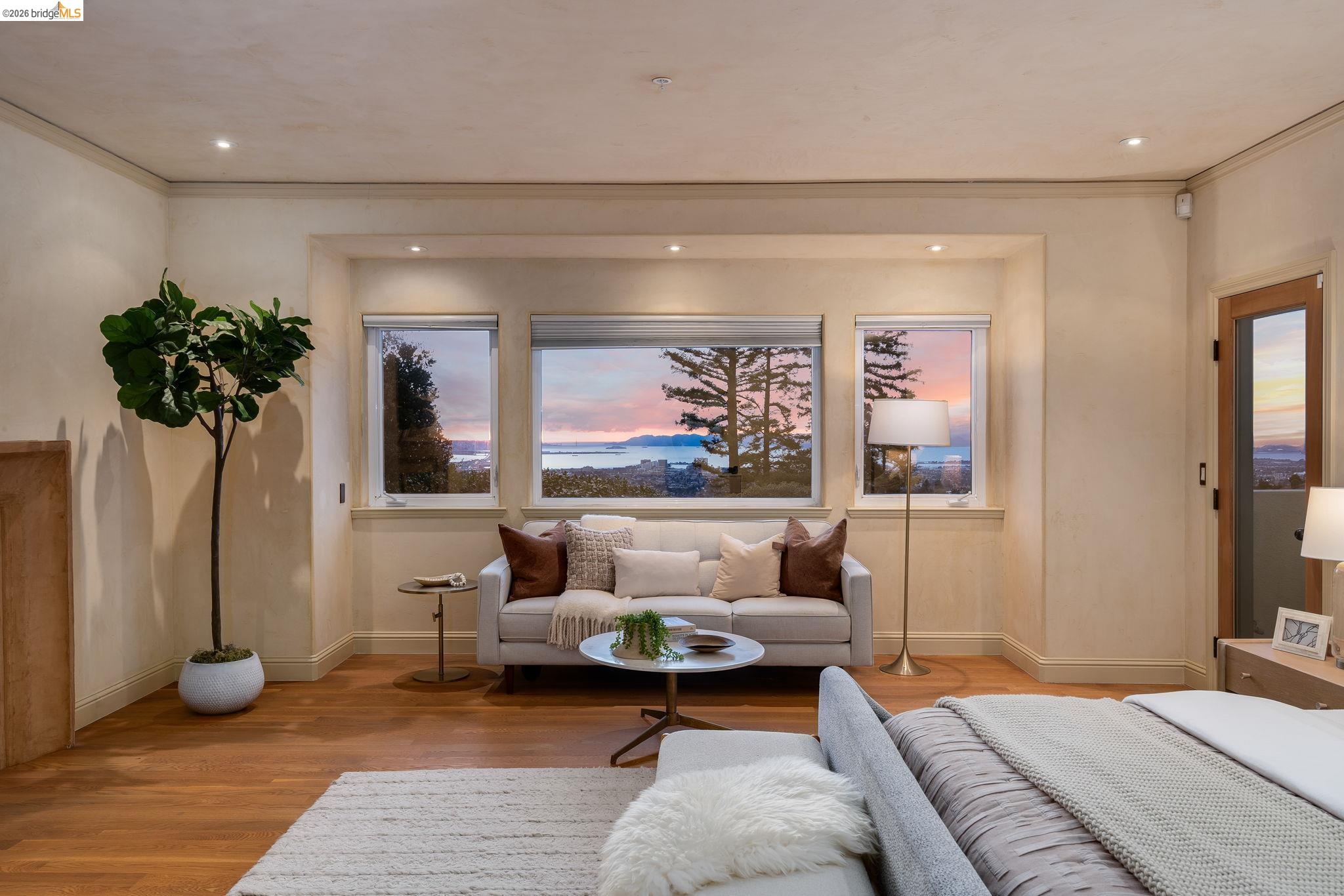 6257 Virgo Road Oakland, CA 94611 - Photo 38 of 60 a living room with furniture and a potted plant