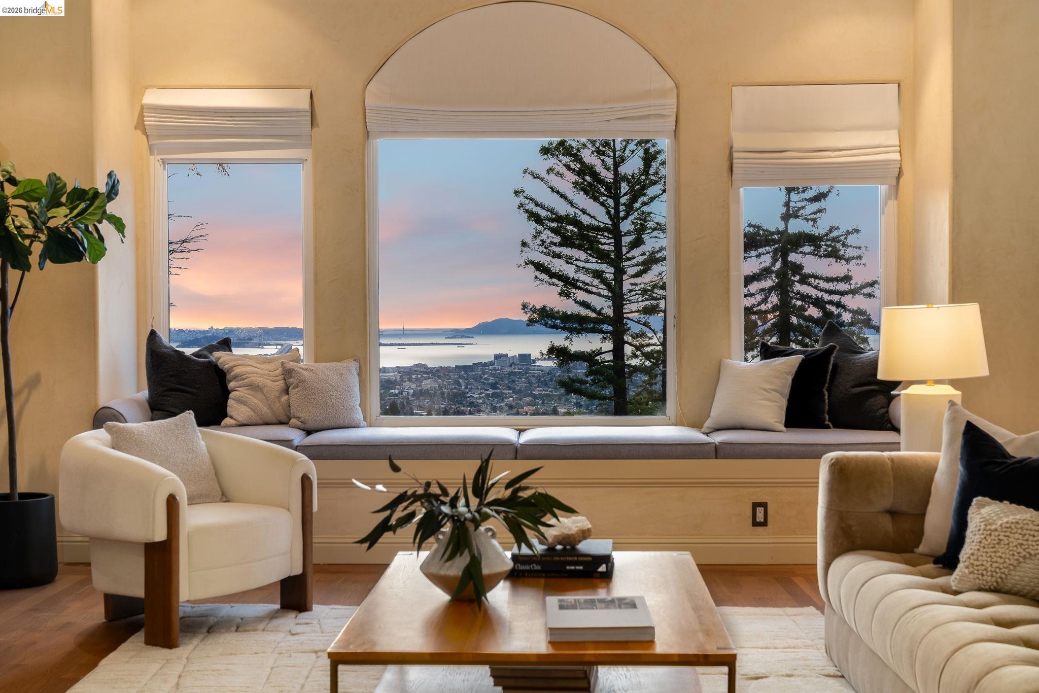 6257 Virgo Road Oakland, CA 94611 - Photo 4 of 60 a living room with furniture flowerpot and a large window