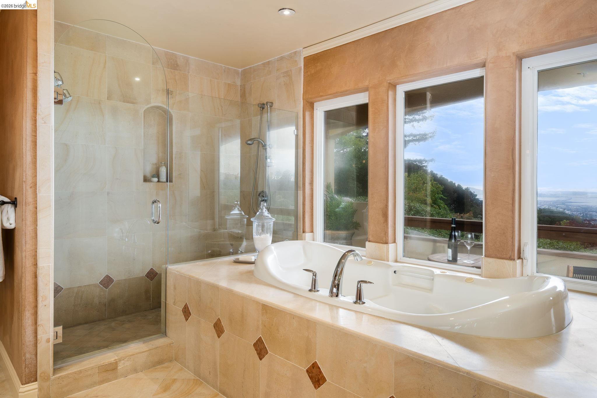 6257 Virgo Road Oakland, CA 94611 - Photo 42 of 60 Full bathroom with a shower stall and a bath