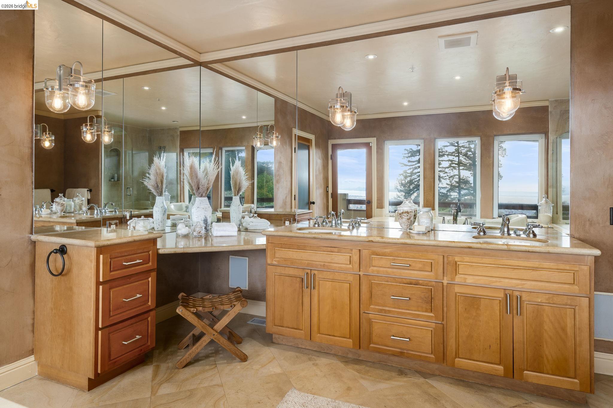 6257 Virgo Road Oakland, CA 94611 - Photo 43 of 60 a bathroom with a sink vanity and a mirror