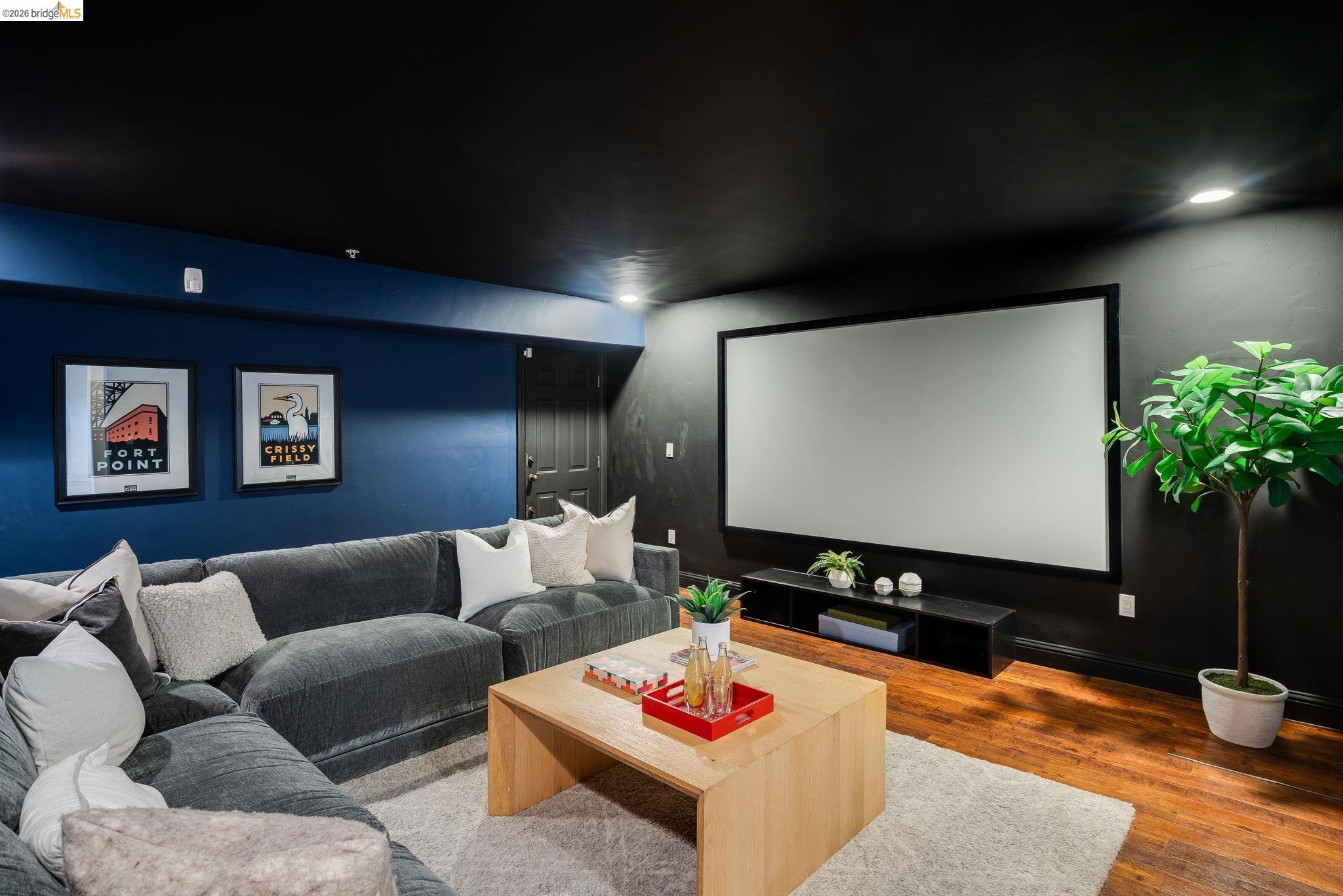 6257 Virgo Road Oakland, CA 94611 - Photo 46 of 60 Cinema room with wood finished floors