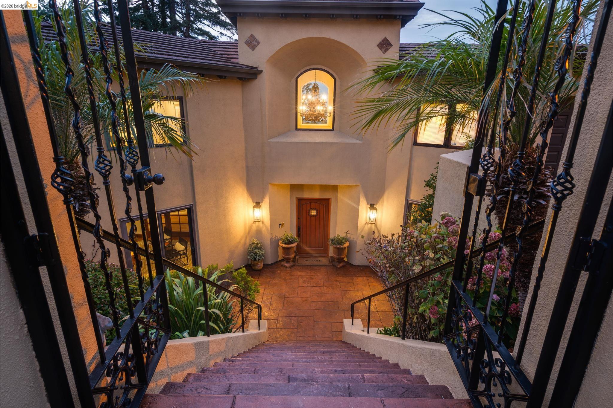 6257 Virgo Road Oakland, CA 94611 - Photo 54 of 60 Property entrance featuring a tiled roof and stucco siding