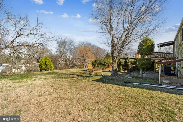 a view of wooden floor with a lake view