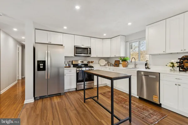 a view of kitchen with breakfast area
