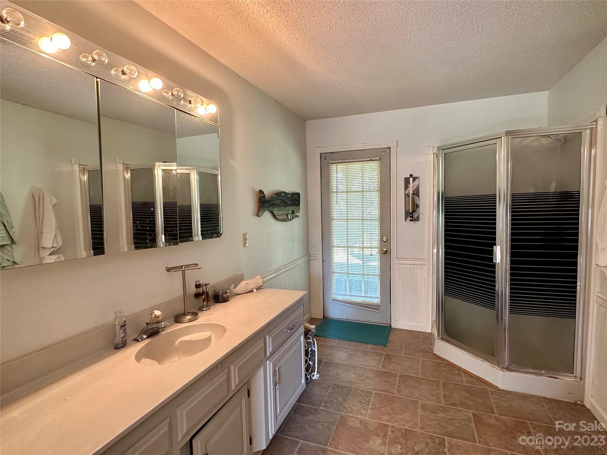 221 Airport Road Rutherfordton, NC 28139 - Photo 8 of 16 a bathroom with a sink a toilet and shower