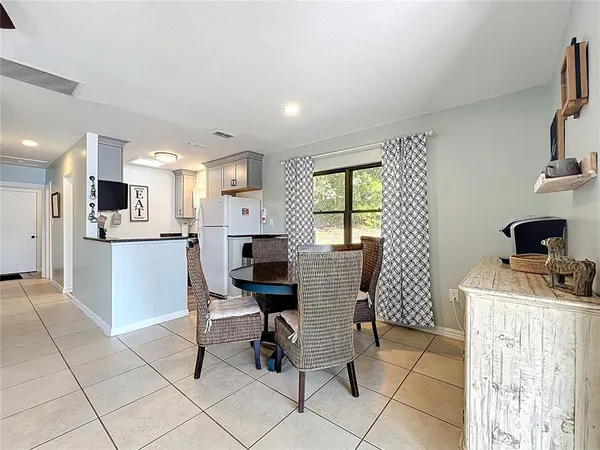 a kitchen with stainless steel appliances granite countertop a stove and a microwave