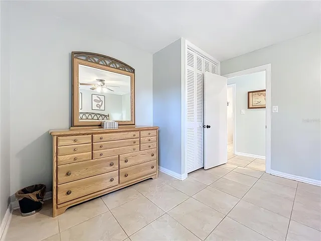 a view of a two chairs in the patio