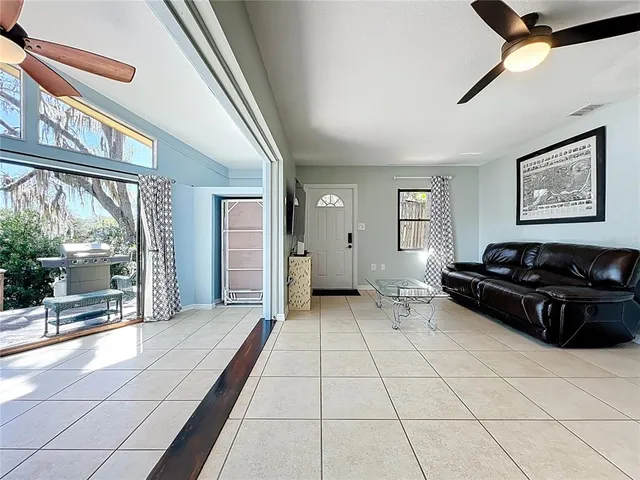 a view of a house with wooden fence