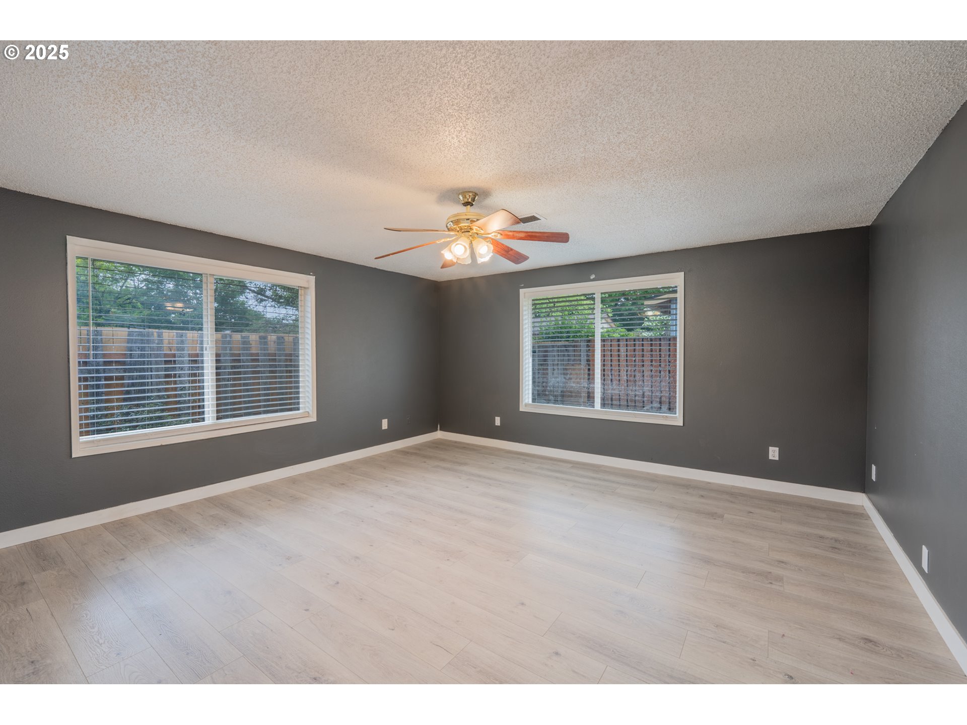 446 44th Avenue Southeast Salem, OR 97317 - Photo 18 of 37 a view of an empty room with a window