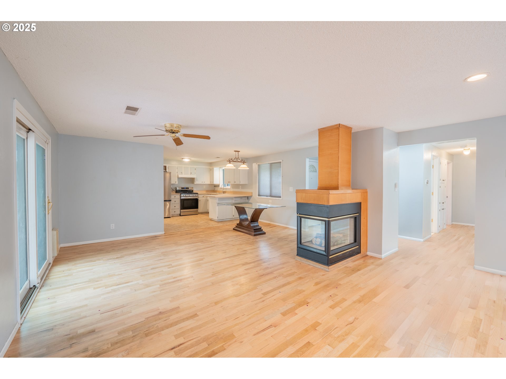 446 44th Avenue Southeast Salem, OR 97317 - Photo 2 of 37 a bedroom with a bed and a table