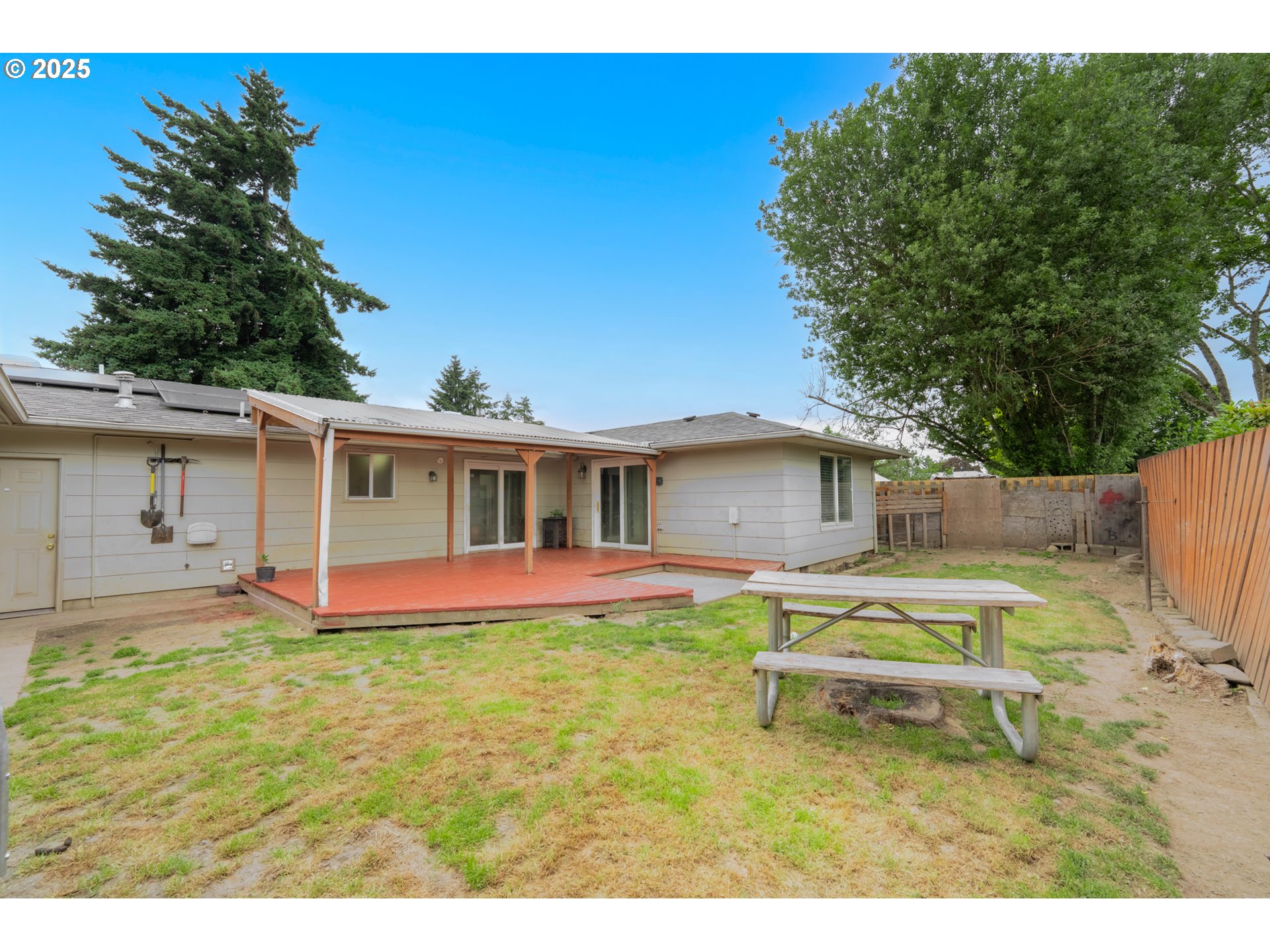 446 44th Avenue Southeast Salem, OR 97317 - Photo 35 of 37 a view of a house with a yard and sitting area