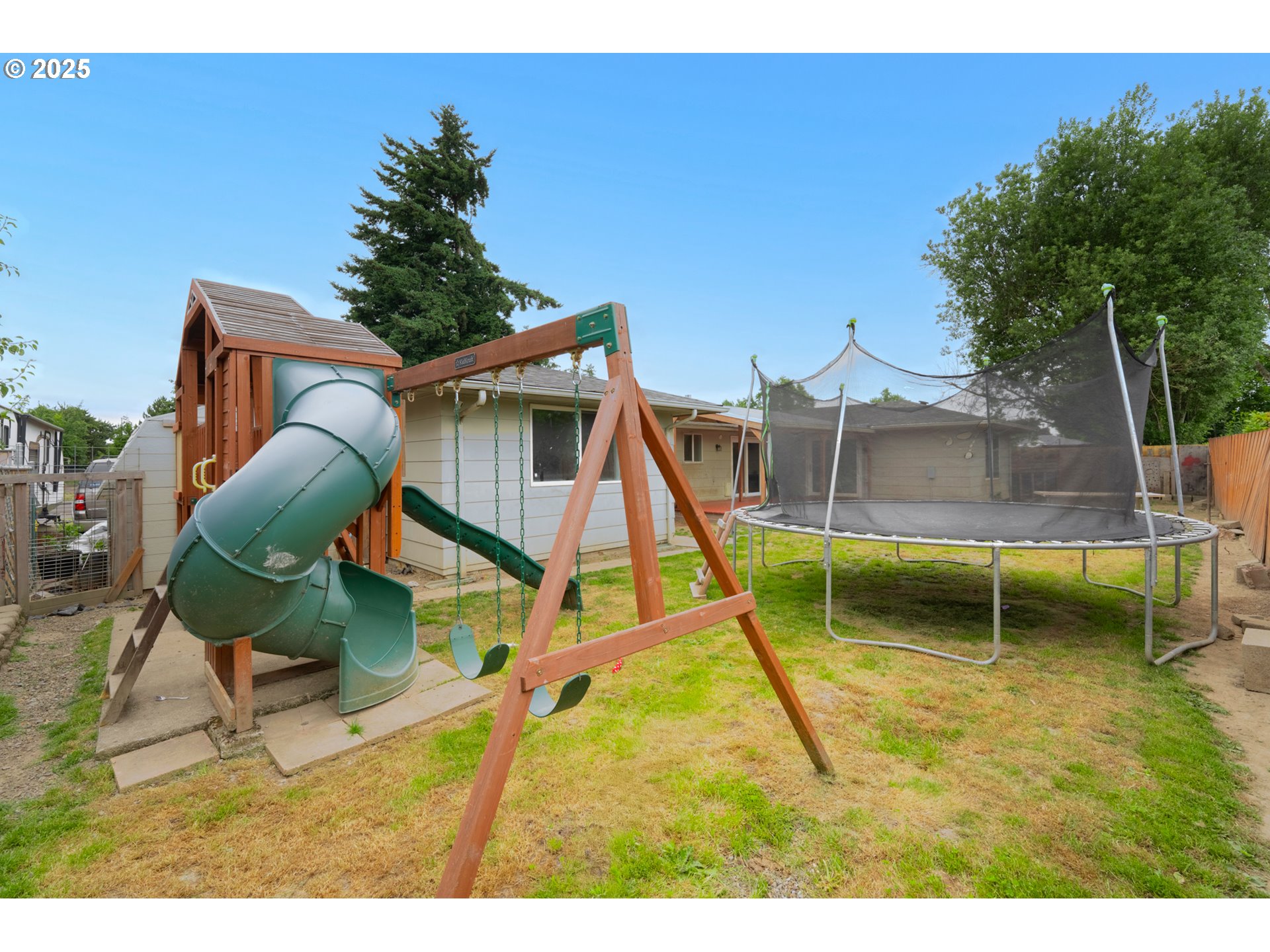 446 44th Avenue Southeast Salem, OR 97317 - Photo 36 of 37 a backyard of a house with table and chairs