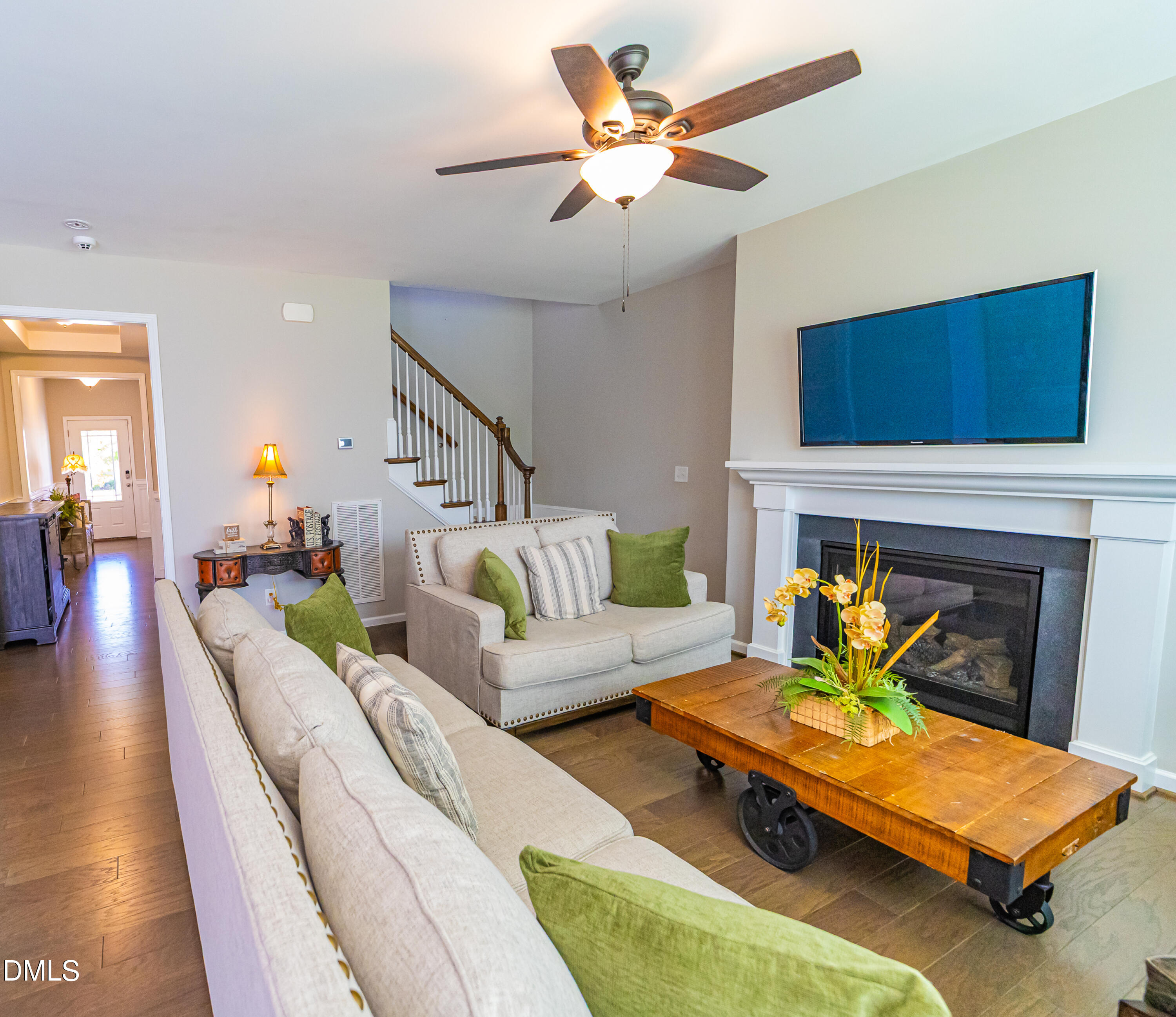 4416 Brintons Cottage Street Raleigh, NC 27616 - Photo 11 of 40 a living room with furniture and a fireplace