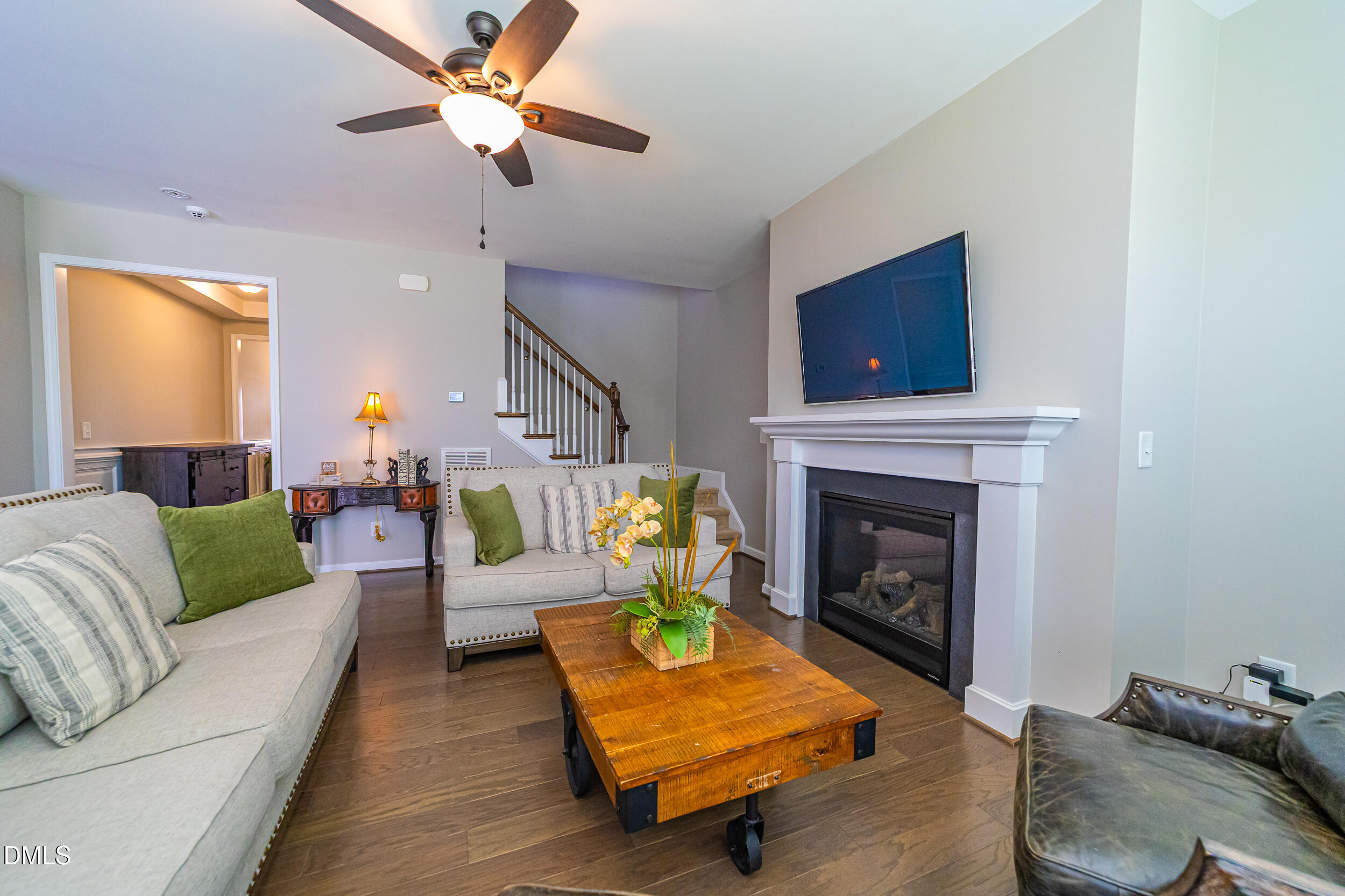 4416 Brintons Cottage Street Raleigh, NC 27616 - Photo 12 of 40 a living room with furniture and a fireplace
