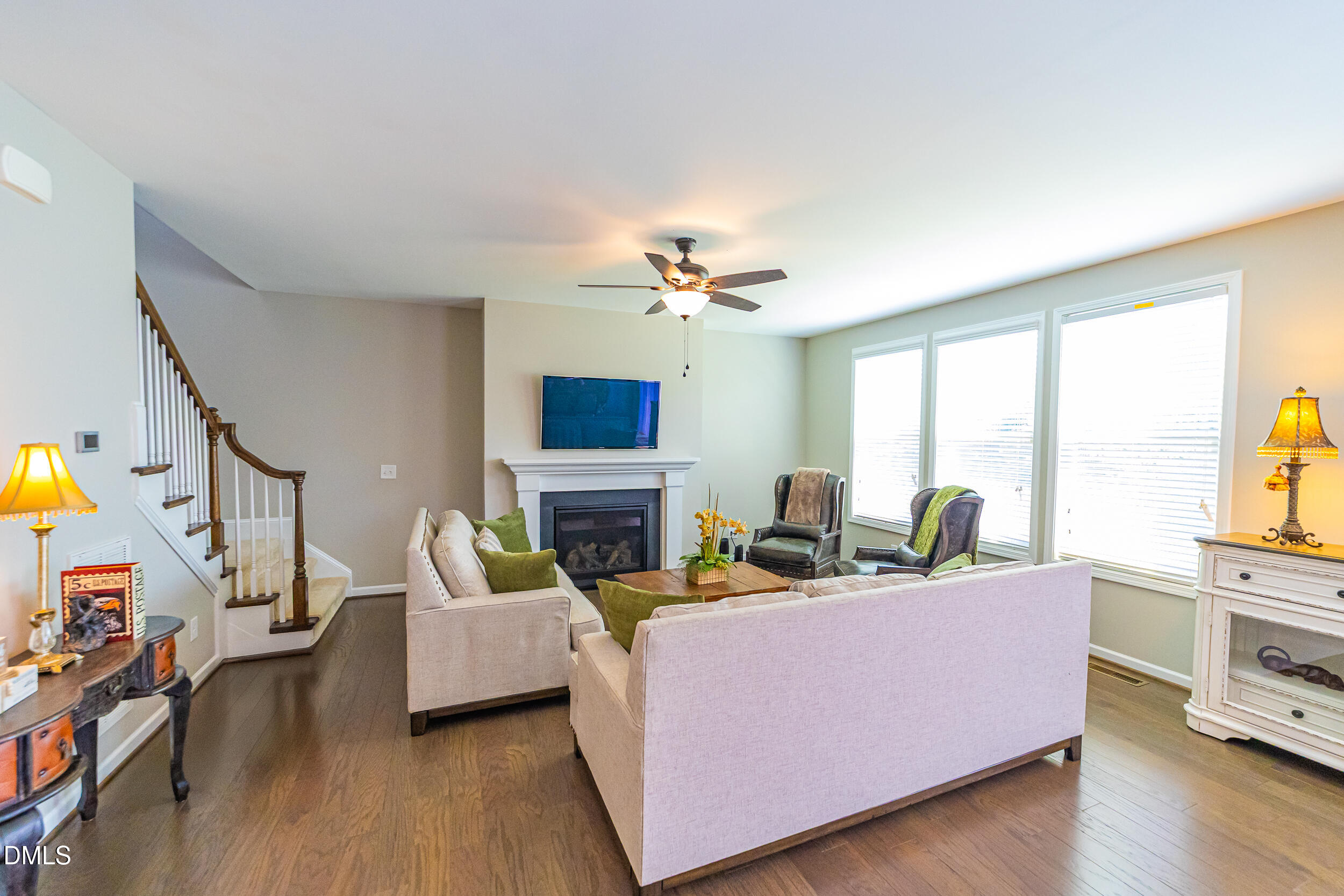 4416 Brintons Cottage Street Raleigh, NC 27616 - Photo 13 of 40 a living room with furniture and a fireplace