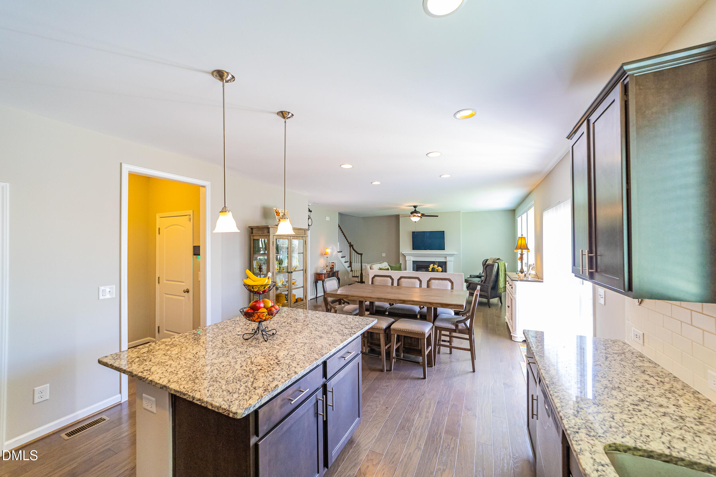 4416 Brintons Cottage Street Raleigh, NC 27616 - Photo 15 of 40 a view of a dining table furniture and chandelier