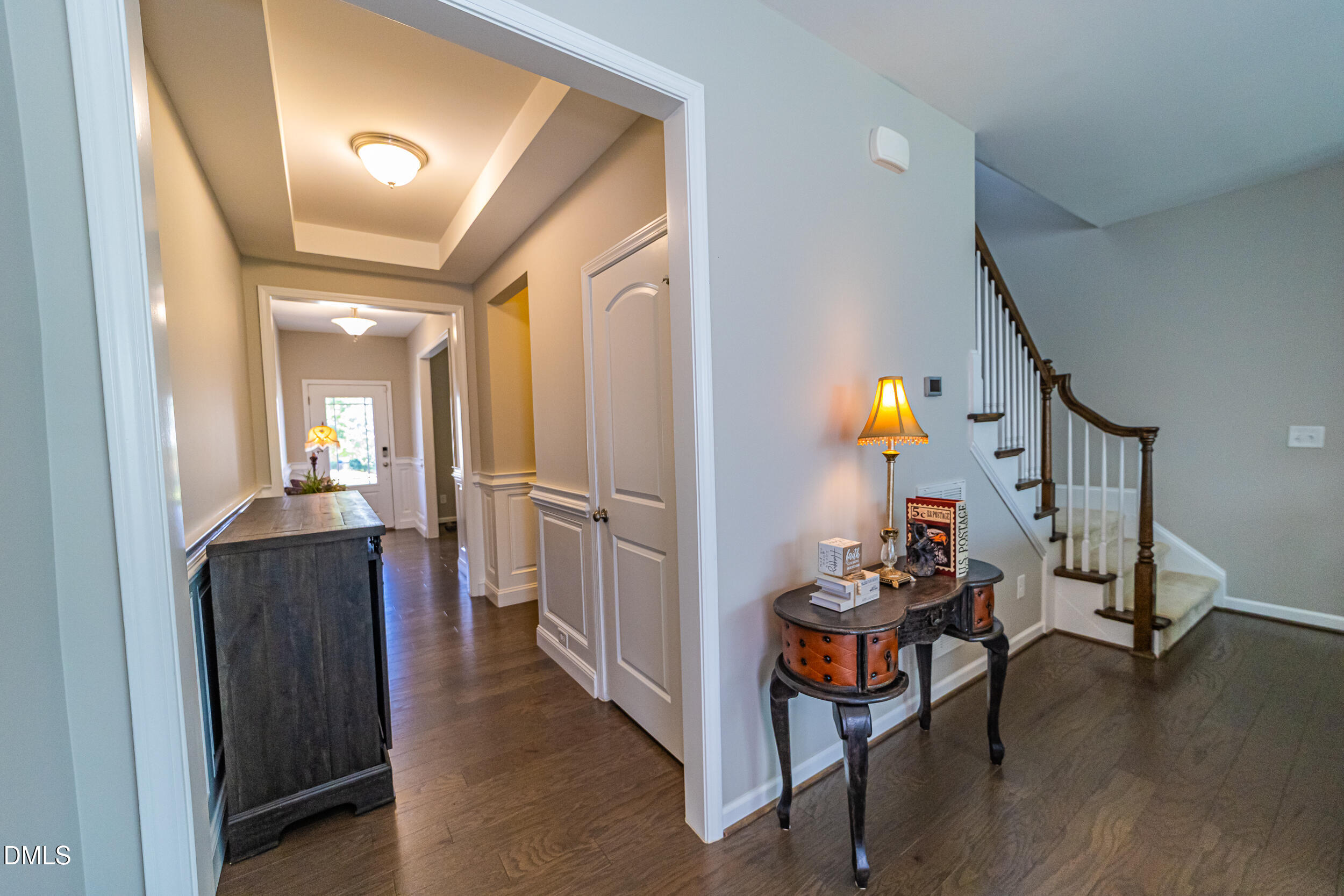 4416 Brintons Cottage Street Raleigh, NC 27616 - Photo 24 of 40 a view of entryway livingroom and hall with wooden floor