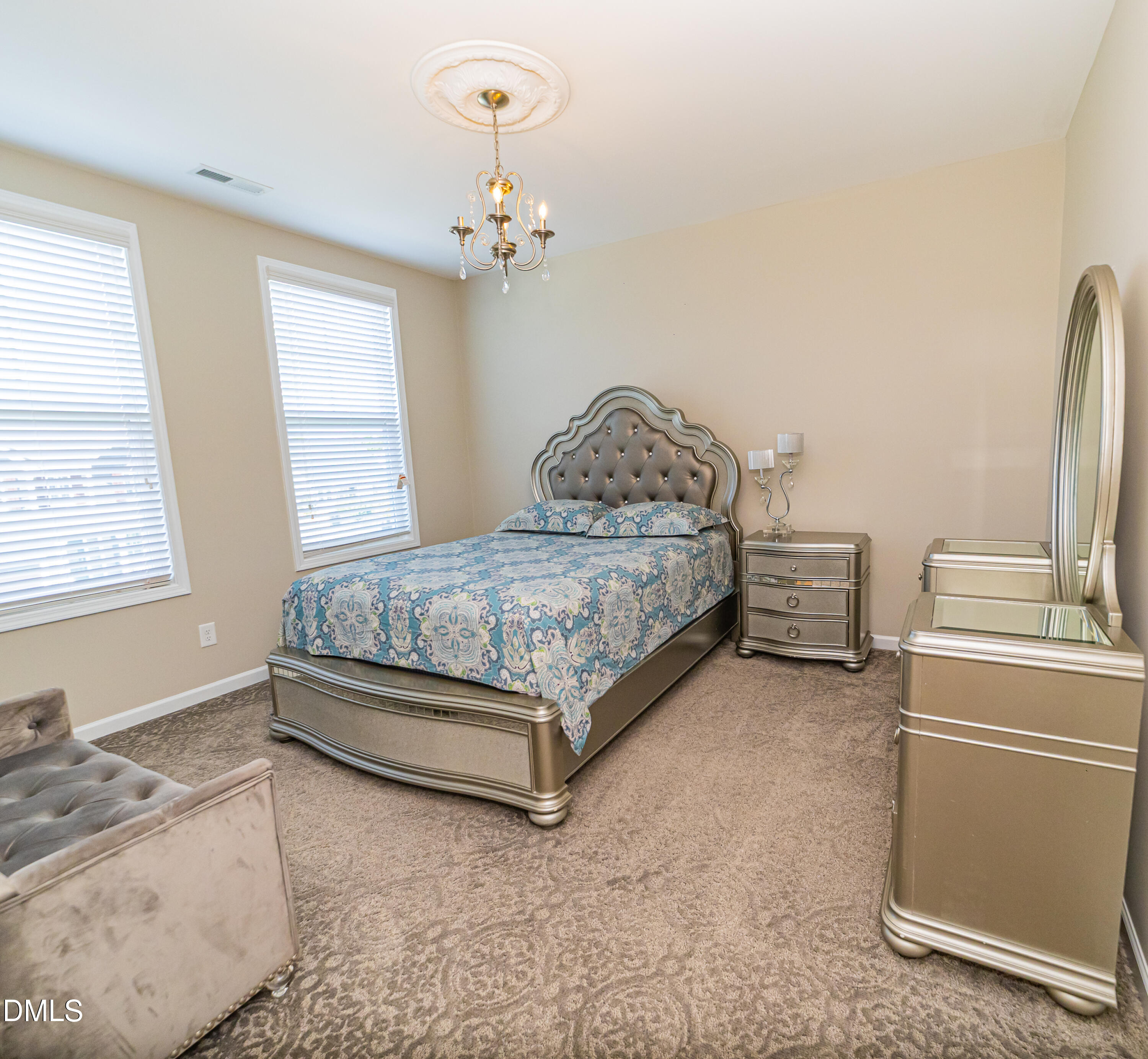 4416 Brintons Cottage Street Raleigh, NC 27616 - Photo 32 of 40 a bedroom with a bed and window