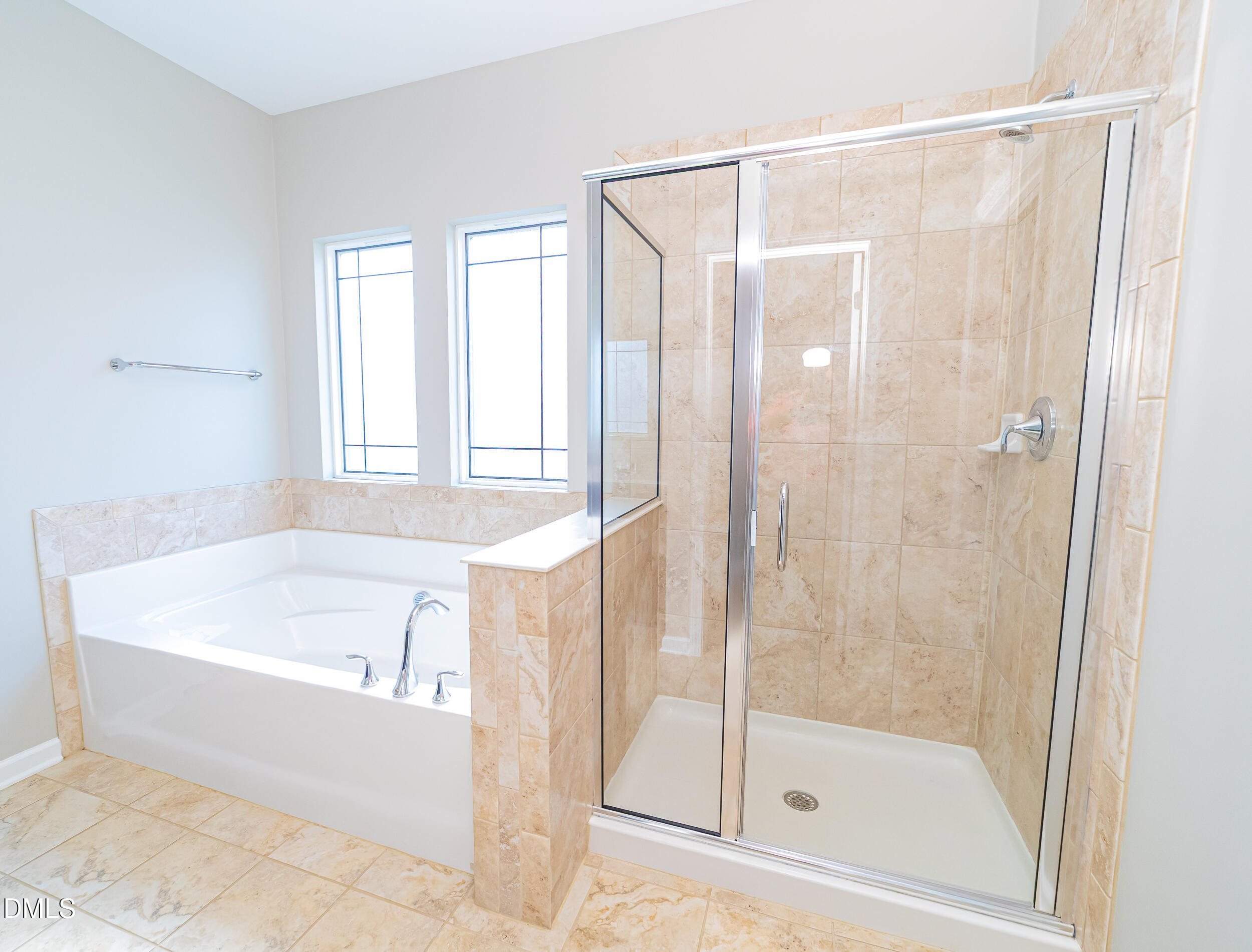 4416 Brintons Cottage Street Raleigh, NC 27616 - Photo 38 of 40 a white bath tub sitting next to a shower