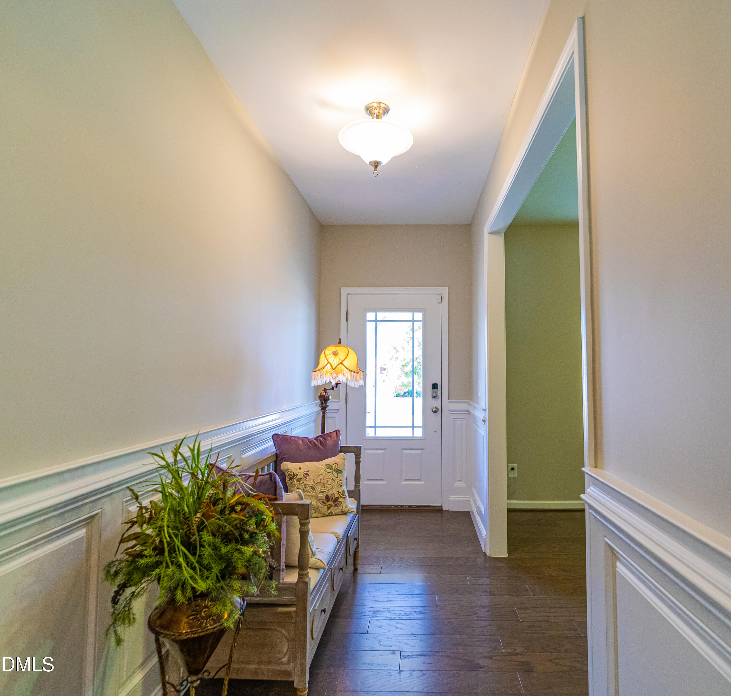 4416 Brintons Cottage Street Raleigh, NC 27616 - Photo 7 of 40 a living room with furniture and a wooden floor