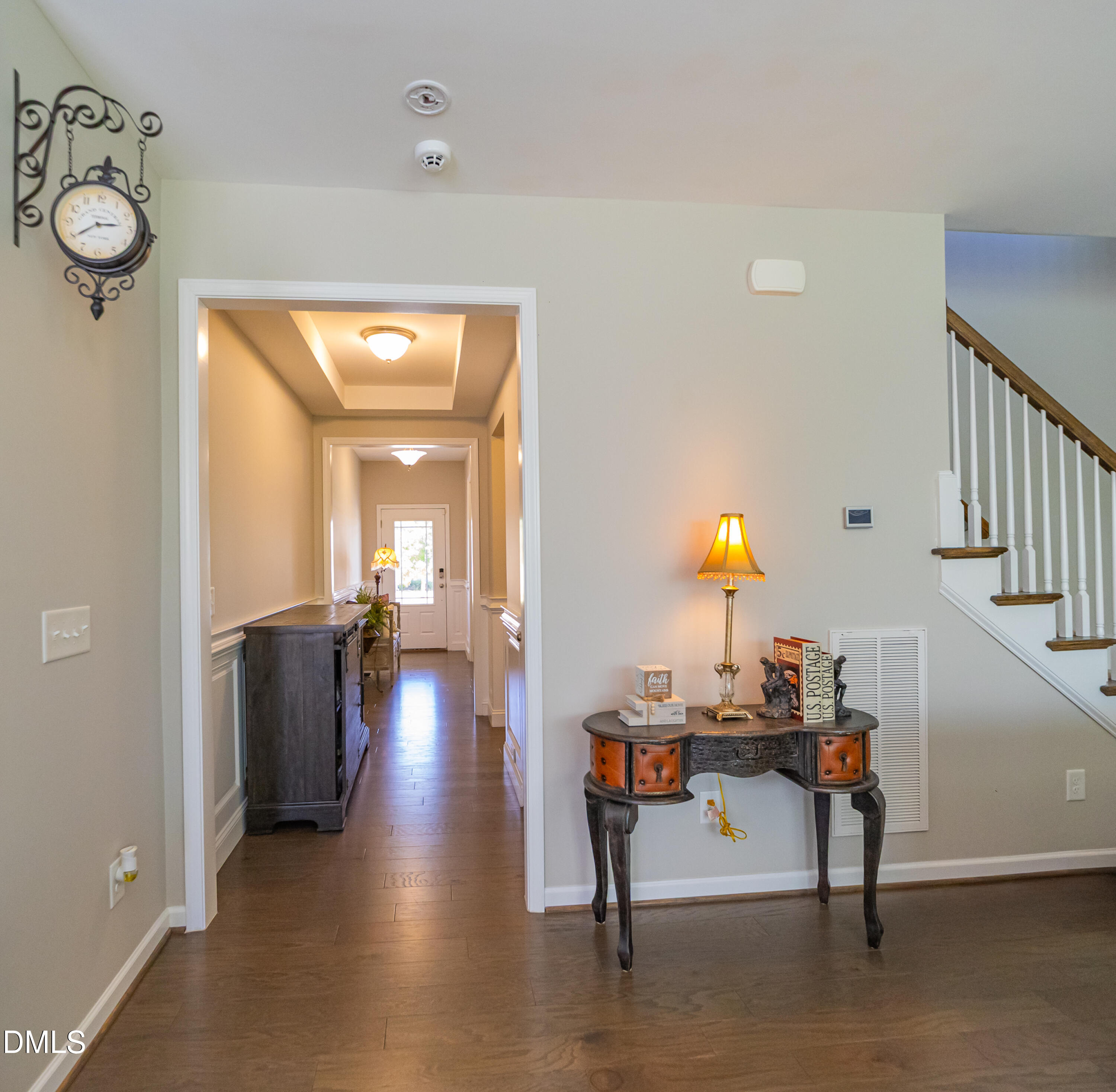 4416 Brintons Cottage Street Raleigh, NC 27616 - Photo 10 of 40 a view of entryway and hall with wooden floor