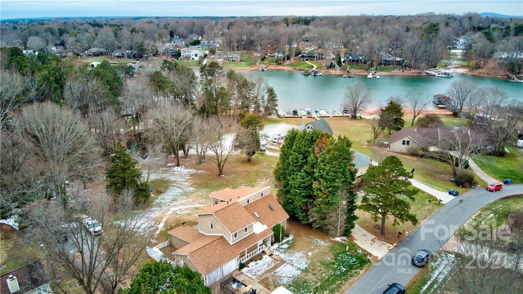 an aerial view of a houses with outdoor space