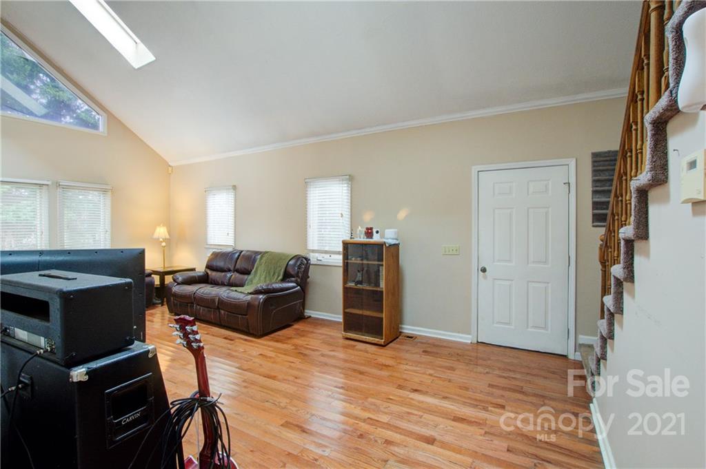 262 Spring Run Road Mooresville, NC 28117 - Photo 12 of 42 a view of a livingroom with furniture and wooden floor