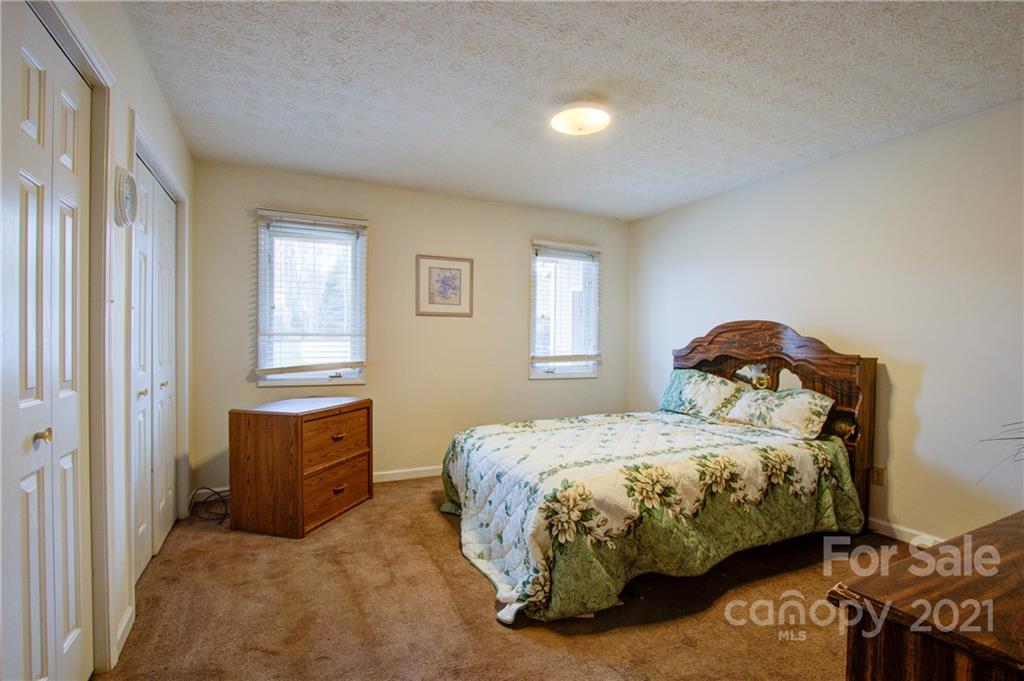 262 Spring Run Road Mooresville, NC 28117 - Photo 21 of 42 a bedroom with a bed and a window