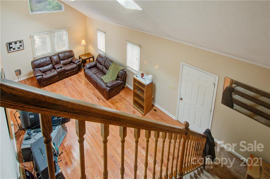 262 Spring Run Road Mooresville, NC 28117 - Photo 25 of 42 a view of a hallway with workspace