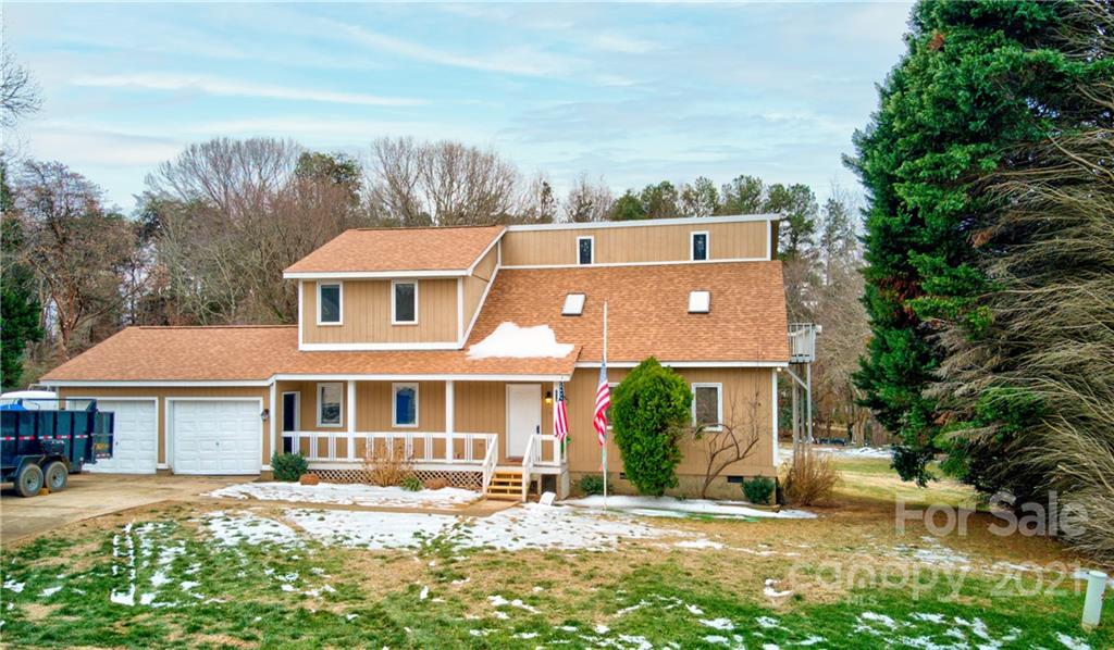 262 Spring Run Road Mooresville, NC 28117 - Photo 3 of 42 front view of a house with a yard